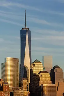 Rises Prints: One World Trade Center also know as The Freedom Tower along other New York City Skyline skyscrapers in Battery Park