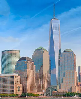 The One World Trade Centre as seen from the Hudson River nestled amongst other giant skyscrapers in Lower Mahattan
