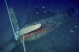 South France Prints: World War II aircraft wreck in deep blue underwater