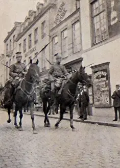 Enter Prints: World war One; The advance forces of German cavalry enter the Belgian town of Spa
