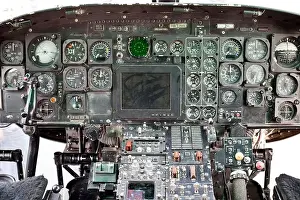 worn instrument panel in cockpit of US Marine Corps Huey helicopter displayed on flight deck of USS New York moored