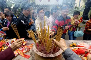 Chinese New Year Prints: Worshippers burning joss sticks at Wong Tai Sin Temple during the Chinese Lunar New Year
