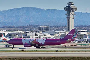 Airliner Prints: WOW Air Airbus A330-300 Being Towed To The Tom Bradley Terminal At Los Angeles International Airport