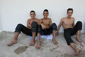 Wrestler Prints: Three Wrestlers Resting, Kirkpinar 654th Oil Wrestling Championships