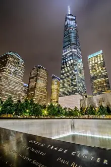 City Lights Prints: One WTC shines brightly in the background of the 9/11 Memorial in Lower Manhttan