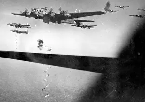 WW11 USAAF B17 Flying Fortress bombers drop their bombs over Germany