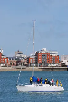 Tidal Prints: Yacht returning to marina, Plymouth Harbour, Gosport, Hampshire, England, United Kingdom