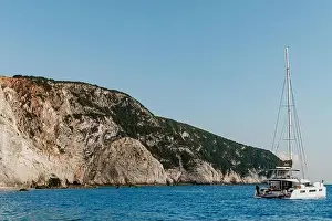 Yacht and Tropic Island. summer mediterranean landscape