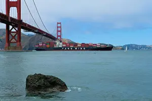 Container Ship Prints: A Yang Ming marine transport ship crossing under the Golden Gate Bridge in San Francisco