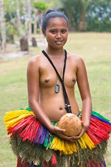 Grass Skirt Prints: Yapese girl in traditional clothing holding coconut at Yap Day Festival
