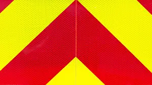 Diversion Prints: yellow and red retroreflective panel on a firefigther truck