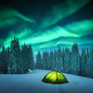 Yellow tent lighted from the inside against the backdrop of incredible starry sky with Aurora borealis. Amazing night landscape