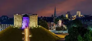 York at night, Yorkshire city of York and Cliffords Tower at night with York Minster in the background