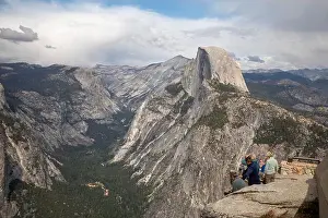 National Park Service Prints: Yosemite National Park, California - Tourists viewing Half Dome in Yosemite National Park from Glacier Point
