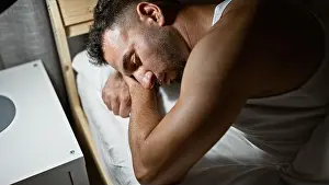 Pajamas Prints: Young arab man lying on bed sleeping at bedroom