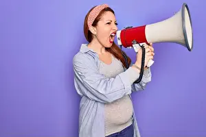 Redhead Prints: Young beautiful redhead speaker woman pregnant