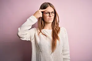 Redhead Prints: Young beautiful redhead woman wearing casual sweater