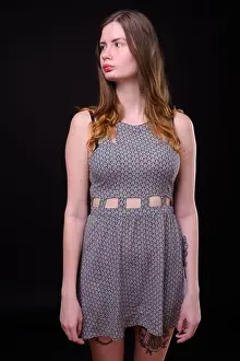 Dyed Prints: Young beautiful Scandinavian woman against black background