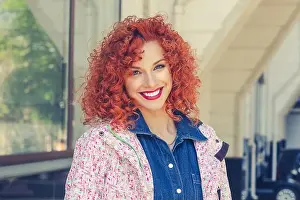 Curly Hair Prints: Young beautiful woman with red curly hair