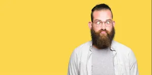Kiss Prints: Young blond man wearing glasses making fish face with lips