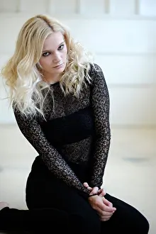 Femininity Prints: Young blonde women wearing black lace top
