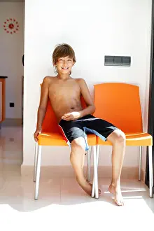Moods Prints: Young boy in a chair