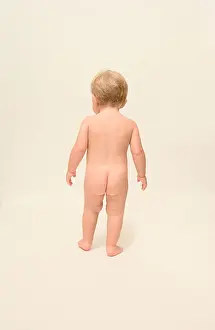 Unclothed Prints: Young boy naked on a white background