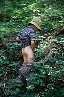 Urgency Prints: A young boy peeing in the woods