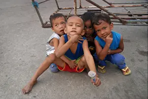 Infants Prints: Young children on the streets of Dumaguete, Negros Oriental, Philippines