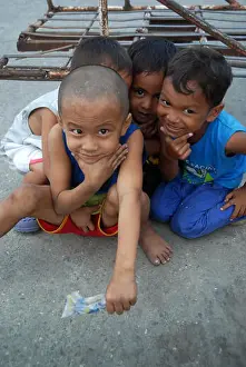 Infants Prints: Young children on the streets of Dumaguete, Negros Oriental, Philippines