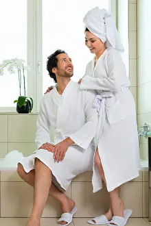 Affectionate Prints: young couple in bathrobe in hotel