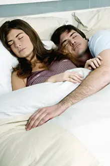 Man Man Prints: Young couple in bed sleeping