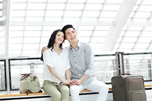 Three Quarter Length Prints: Young couple at subway station