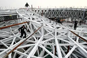 Expo Prints: Young Danish men stunt on the steel structure of the Denmark Pavilion in Shanghai