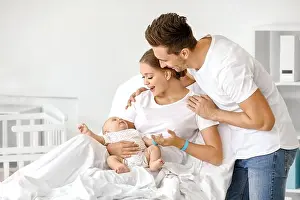 Parenthood Prints: Young family with newborn baby in maternity hospital