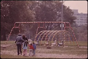 Young Family Prints: YOUNG FAMILY IN A SOUTH SIDE CHICAGO PARK AT THE 35TH STREET BEACH