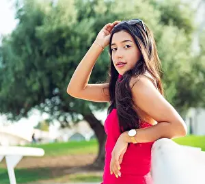 Latina Prints: young girl brunette Latina with long black hair and black eyes