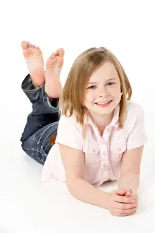 11 Year Old Prints: Young Girl Lying On Stomach In Studio
