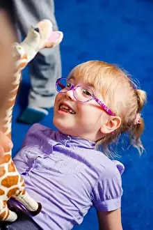 Braids Prints: Young girl is ready to start school in a uniform wearing a backpack