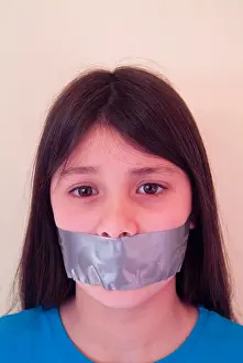 Opinion Prints: Young girl with tape over her mouth to illustrate suppression of freedom of speech