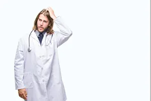 Confusion Prints: Young handsome doctor man with long hair over isolated background confuse and wonder about question