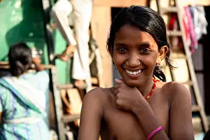 Cleanliness Prints: Young Indian girl posing outside shanty home, D'Mello Road, Mumbai, India