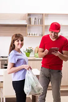 Receipt Prints: Young male courier in food delivery concept
