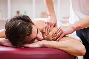 Massaging Prints: Young man is enjoying massage on spa treatment