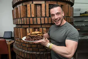 Bodybuilding Prints: Young Man Is Very Hungry - He Is Ready To Eat Cevapi In Bread