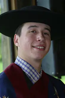Parque Prints: A young man in native costume at Parque Aiken del Sur a natural forest preserve near Puerto Chacabuco Chile