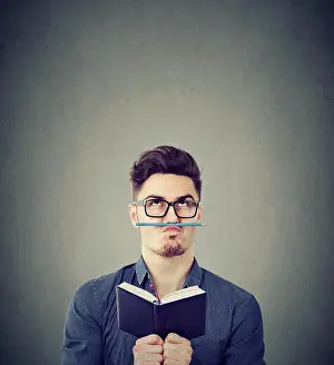 Anxious Prints: Young man with notepad playing with pencil instead of moustache fighting with boredom