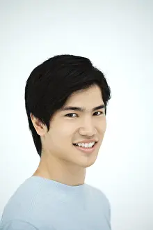 Asians Prints: Young man smiling at camera, portrait