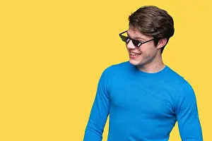 Perfect Prints: Young man wearing funny thug life glasses over isolated background looking away to side with smile on face