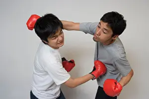 Black Hair Prints: Two young men fighting